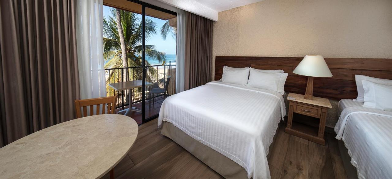 Double Room with Two Double Beds and Ocean View,1520446789:JPEG