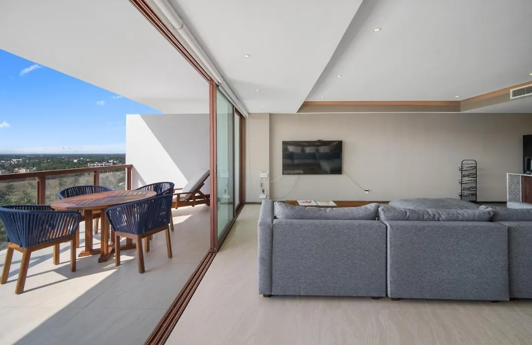 Beachfront Bliss: Luxurious 4-Bedroom Apartment-1